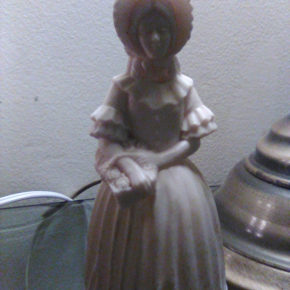 Avon fragrance figurine